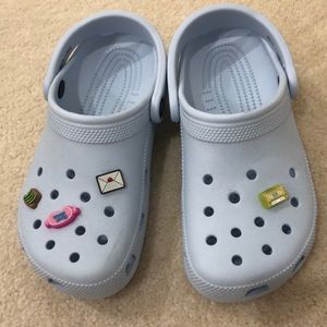 Crocs Blue Clogs with jibbits